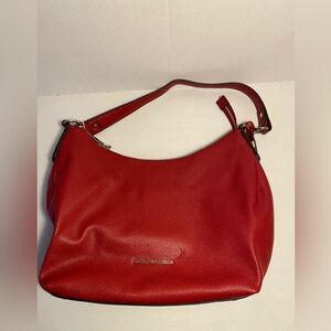 Dana Buchman Red Handbag. Like new. Original owner. Includes crossbody strap.